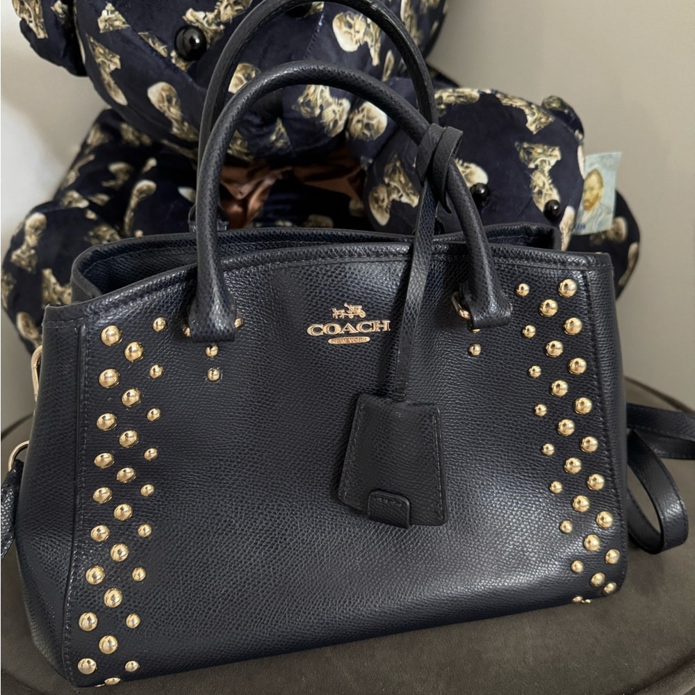 Navy blue gold studded coach handbag